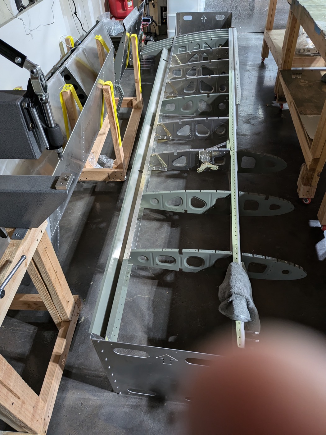 Sling TSi wing structure under construction: aluminum ribs and spar on the workshop floor